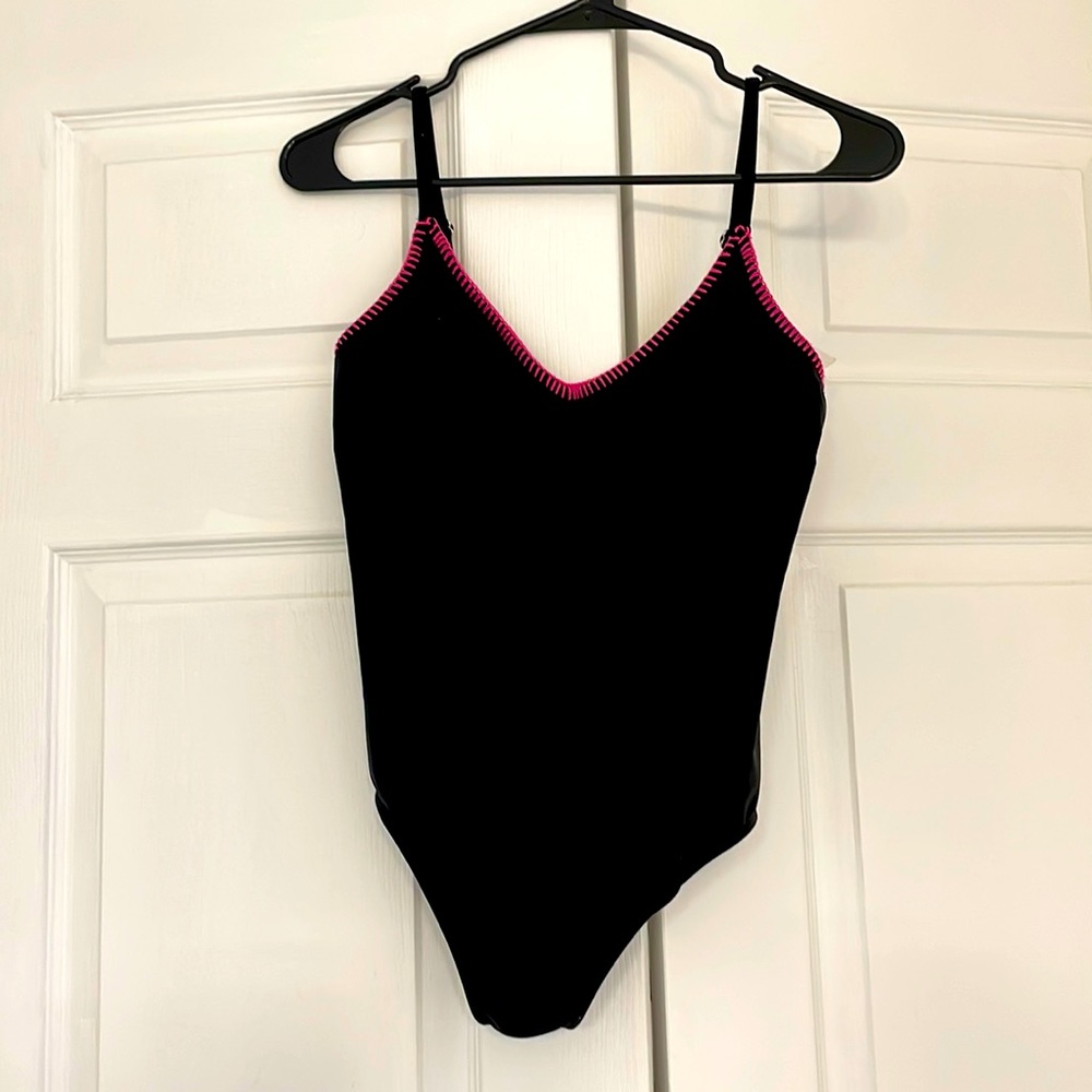 Women’s hot pink and black O’Rageous bathing suit